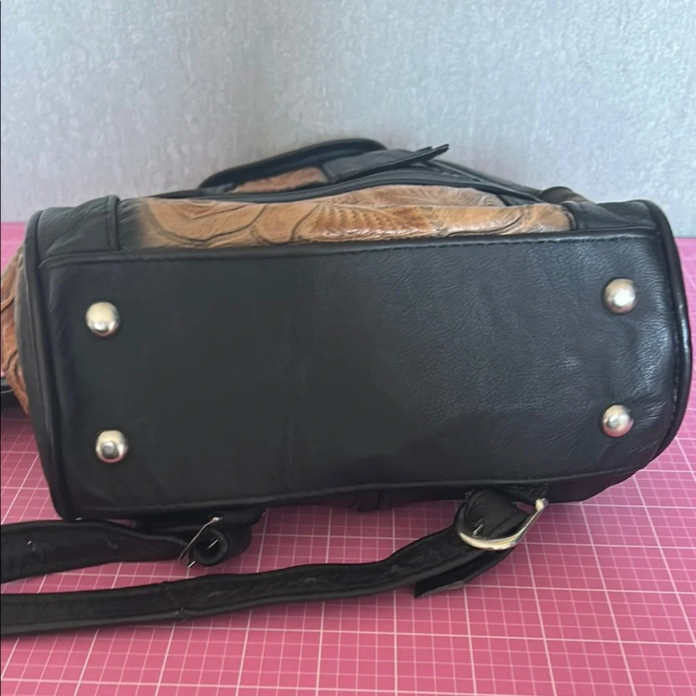 Stylish Black and Brown Backpack with Leather Accents